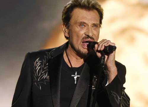 Johnny Hallyday chante lors des Victoires de la musique le 28 février 2009/B. TESSIER / REUTERS
